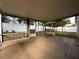 Spacious screened-in patio with views of the fenced backyard and landscaping at 5906 Rywood Dr, Orlando, FL 32810