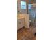 Well-maintained bathroom with a glass-enclosed shower and tile flooring at 9549 Sw 53Rd Cir, Ocala, FL 34476