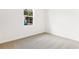 Spacious bedroom with neutral carpeting and large window at 4212 Sawtooth Ct, Tavares, FL 32778