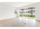 Living area with sliding glass doors leading to the backyard at 4212 Sawtooth Ct, Tavares, FL 32778