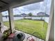 Backyard view from the covered patio at 8118 Platts Ave, Orlando, FL 32832