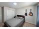 Bedroom with two guitars on the wall at 8118 Platts Ave, Orlando, FL 32832