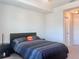 Bedroom with fan, window, and neutral carpet at 8118 Platts Ave, Orlando, FL 32832