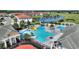 Resort-style pool with water features, tennis court, and community homes at 107 Hampton Loop, Davenport, FL 33837
