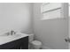 Clean bathroom with toilet and vanity at 107 Hampton Loop, Davenport, FL 33837