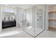 Elegant bathroom featuring a large walk-in shower and soaking tub at 107 Hampton Loop, Davenport, FL 33837