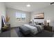 Comfortable bedroom with carpeted floor and window at 107 Hampton Loop, Davenport, FL 33837
