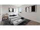 Spacious bedroom with large bed, nightstands, and ample natural light at 107 Hampton Loop, Davenport, FL 33837