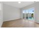 Bedroom with sliding doors leading to a private pool at 107 Hampton Loop, Davenport, FL 33837