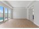 Bright bedroom with hardwood floors and access to a pool at 107 Hampton Loop, Davenport, FL 33837