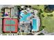 Overhead shot of community amenities, including pools, tennis courts, playgrounds, and common areas at 107 Hampton Loop, Davenport, FL 33837
