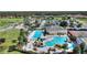 Relaxing pool area with waterslide and lounge chairs at 107 Hampton Loop, Davenport, FL 33837