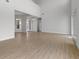 Spacious living room featuring high ceilings and tile flooring at 107 Hampton Loop, Davenport, FL 33837