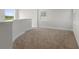 Spacious loft bedroom with carpet and window at 107 Hampton Loop, Davenport, FL 33837