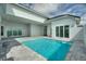 Inviting pool area with a modern design and spacious patio at 107 Hampton Loop, Davenport, FL 33837