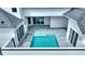 Inviting private pool area featuring a sparkling pool with a water feature and stylish brick pavers at 107 Hampton Loop, Davenport, FL 33837