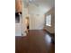 Open living room with soaring ceilings, hardwood floors, and a chandelier at 11774 Via Lucerna Cir, Windermere, FL 34786