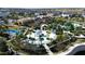 Community featuring a large pool, water slide, playground, clubhouse, and lush tropical landscaping at 1612 Herrons Green Path, Kissimmee, FL 34747