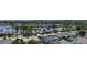 Expansive aerial view of a tranquil neighborhood with lush greenery and a scenic lake at 14421 Hatchee Ct, Orlando, FL 32837