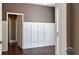 Spacious room with white trim, hardwood floors, and neutral walls at 14421 Hatchee Ct, Orlando, FL 32837