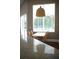 Bright breakfast nook featuring a table with seating for four and a large window with natural light at 14421 Hatchee Ct, Orlando, FL 32837