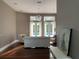 Bright living room with hardwood floors, French doors to pool, and ample seating at 14421 Hatchee Ct, Orlando, FL 32837