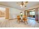 Cozy dining area with sliding glass doors and natural light at 1775 Sundance Dr, St Cloud, FL 34771