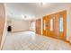 Bright entryway with tile flooring, decorative front door, and ample natural light at 1775 Sundance Dr, St Cloud, FL 34771
