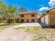 Charming brick home with a spacious three-car garage and a well-maintained lawn at 1775 Sundance Dr, St Cloud, FL 34771