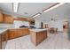 Bright and spacious kitchen with light tile floors and neutral countertops at 1775 Sundance Dr, St Cloud, FL 34771