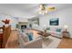 Welcoming living room with a cozy fireplace and comfortable seating arrangement at 1775 Sundance Dr, St Cloud, FL 34771