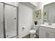 Bright bathroom showcasing a walk-in shower, white vanity, and tile flooring at 500 Summit River Dr, Apopka, FL 32712