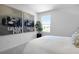 Bedroom with a window, white walls and two unique paintings at 500 Summit River Dr, Apopka, FL 32712