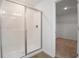 Modern bathroom featuring a glass enclosed shower and tile flooring at 500 Summit River Dr, Apopka, FL 32712