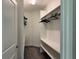 Walk-in closet with carpeted floor, shelving, and hanging space for clothing storage at 1077 Quaker Ridge Ln, Davenport, FL 33896
