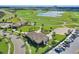 Community clubhouse near a golf course features manicured lawns and attractive landscaping, offering leisure and recreational opportunities at 1077 Quaker Ridge Ln, Davenport, FL 33896