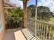 Screened balcony overlooking lush trees and a golf course at 13512 Turtle Marsh Loop # 736, Orlando, FL 32837