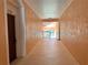 Well-lit hallway with access to building exterior at 13512 Turtle Marsh Loop # 736, Orlando, FL 32837