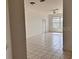 Bright living room with tile floors and access to other rooms at 13512 Turtle Marsh Loop # 736, Orlando, FL 32837