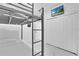 Bright bedroom featuring bunk beds, closet, wall-mounted TV, and light walls at 1740 N Hampton Dr, Davenport, FL 33897