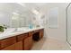 Double vanity bathroom with a large mirror at 331 Ballo Dr, Kissimmee, FL 34746