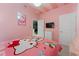 Hello Kitty themed bedroom with twin bed and dresser at 331 Ballo Dr, Kissimmee, FL 34746