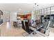Modern dining room with glass table and black chairs at 331 Ballo Dr, Kissimmee, FL 34746