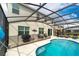 Private screened-in pool and patio area at 331 Ballo Dr, Kissimmee, FL 34746