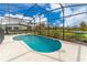 Private screened-in pool with patio furniture at 331 Ballo Dr, Kissimmee, FL 34746