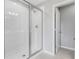 Bathroom with a large glass shower enclosure at 4200 Sawtooth Ct, Tavares, FL 32778