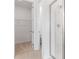 Bright bathroom featuring a glass enclosed shower and walk-in closet at 4224 Sawtooth Ct, Tavares, FL 32778