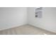 Comfortable carpeted bedroom with a window and neutral wall color scheme at 4224 Sawtooth Ct, Tavares, FL 32778