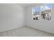 Well lit bedroom boasts carpet, a bright window, and a soothing neutral wall color scheme at 4224 Sawtooth Ct, Tavares, FL 32778