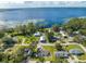 Aerial view of a home near a large lake and lush green surroundings at 2909 Annalee Rd, Saint Cloud, FL 34771